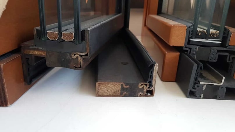 A close up photo showing the inner workings of an FBS steel security window frame.