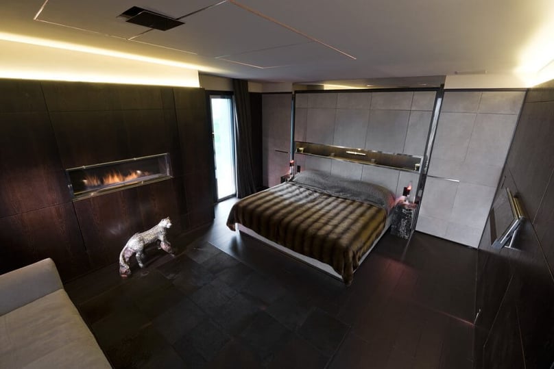 A photo of the interior of a bedroom fortified with a security door and our Sanctuary Management System.