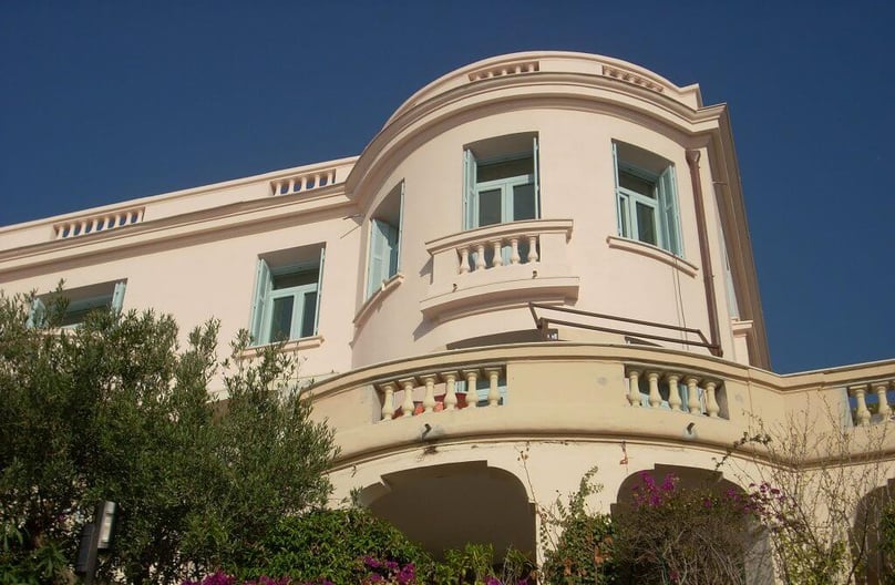 A photo of a luxury home with high security windows installed.