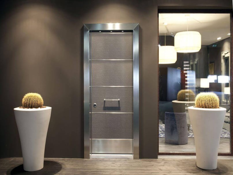 A photo of an interior fortified home security door.