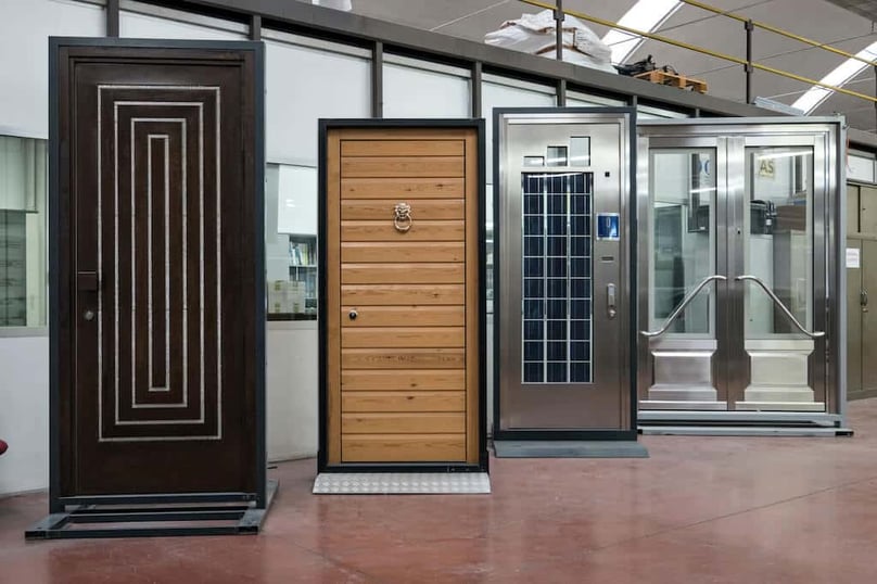 Four custom security doors temporarily installed in frames for testing.